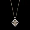 Buccellati OPERA GALILEO WHITE AND YELLOW GOLD PENDANT