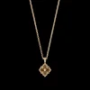 Buccellati OPERA TULLE PENDANT IN YELLOW GOLD WITH ONYX