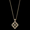 Buccellati OPERA TULLE YELLOW GOLD PENDANT WITH ONYX AND DIAMONDS